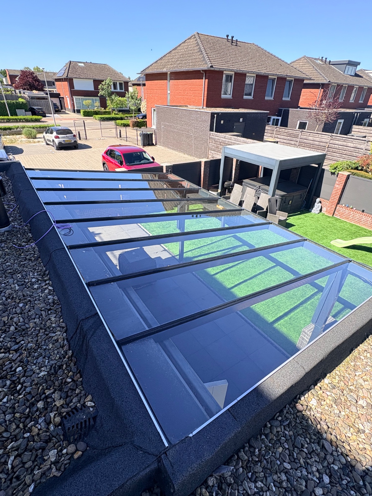 Reinigen glazen overkapping project realisatie door Starclean ramenwasser